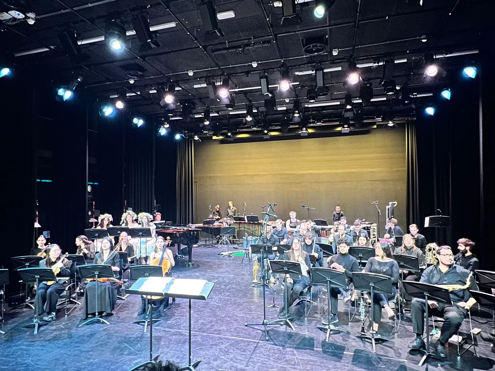 Orchestra and big band on stage before a performance